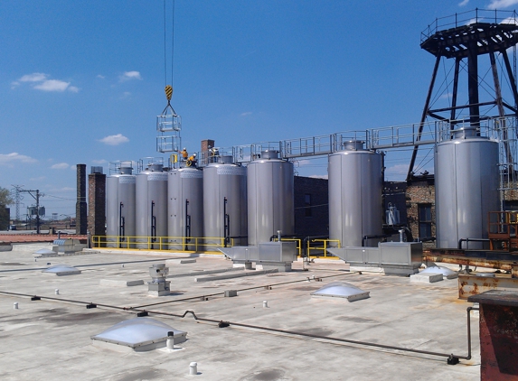 Corcoran Fabrication - Alsip, IL. 7 tanks, glycol lines, sanitary stainless, catwalks, railing, they do it all!