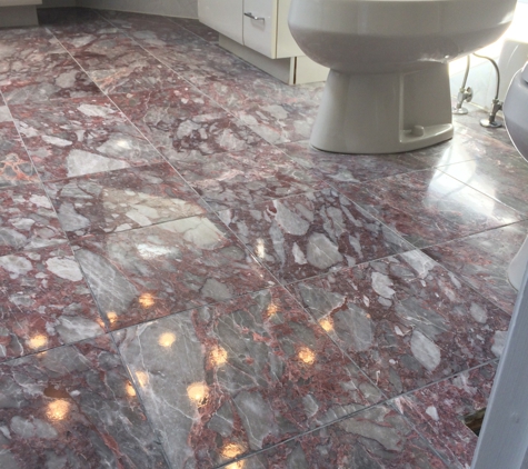 Da Vinci Stone Restoration - Branford, CT. Polished marble bath floor.