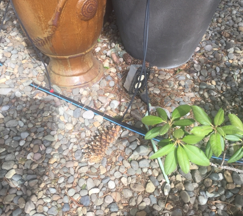 Badillo's Landscaping - Yakima, WA. Open electrical box left which is very unsafe.