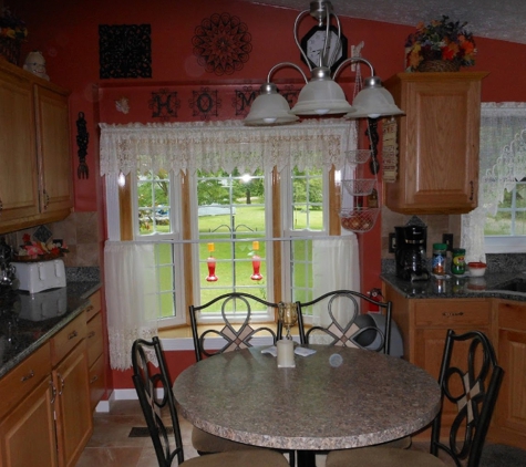 Indiana Window & Siding. Inside, our beautiful new dining room bay window.