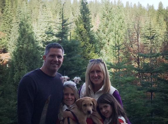 Snowy Peaks Christmas Tree Farm - Foresthill, CA. Our new puppy, Max enjoying our family tradition!