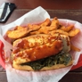 Delia's Chicken Sausage Stand - Atlanta, GA. Smack and Cheese slinger! Yummy collards