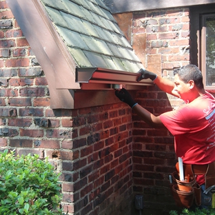 Spotless Gutter Cleaning & Repair Inc - Garden City, NY. Installing the gutter