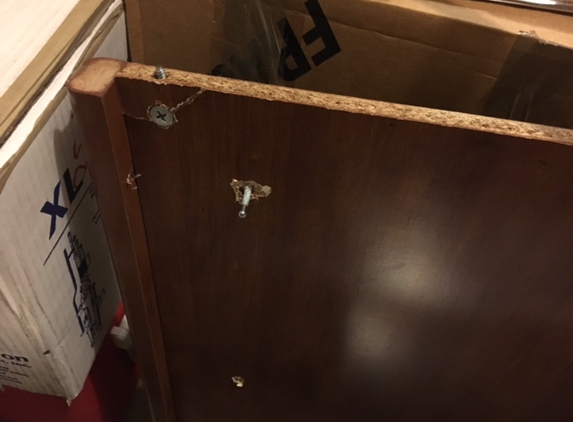 Prestige Movers - Philadelphia, PA. Broken piece of desk