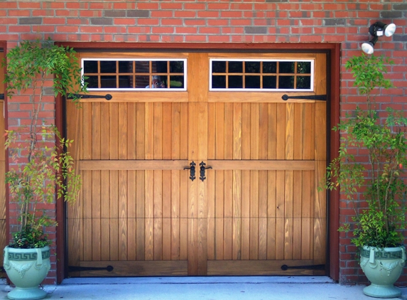 Atlantic Coast Garage Doors - Jacksonville, FL. Designers and Builders of Custom Carriage House Garage Doors