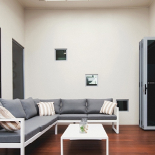 Bradnam's Windows & Doors - Ashmore, QLD. Ultra Silver Aluminium Bi-Fold Door With Grey Glass