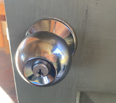 ABC Locksmith Service. New Baldwin knob and extended lip strike plate