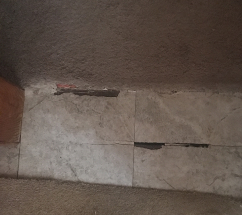 Ayala's Handyman Services - Omaha, NE. Uneven floor placed tile on it any eay