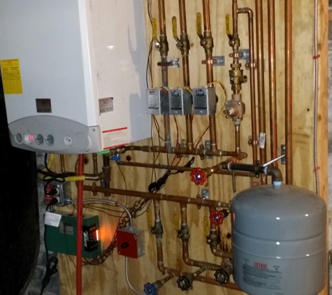 KB Construction - Swanton, VT. A gas boiler combo unit installed by kb.