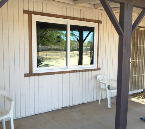 Design Windows & Doors Inc - Ontario, CA. Front of house (I took the wood framing down for the install)
