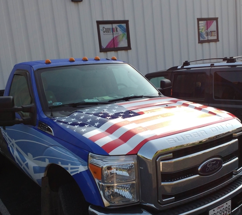 Quik Signs Hagerstown - Hagerstown, MD. American flag on hood - Landmark Fence