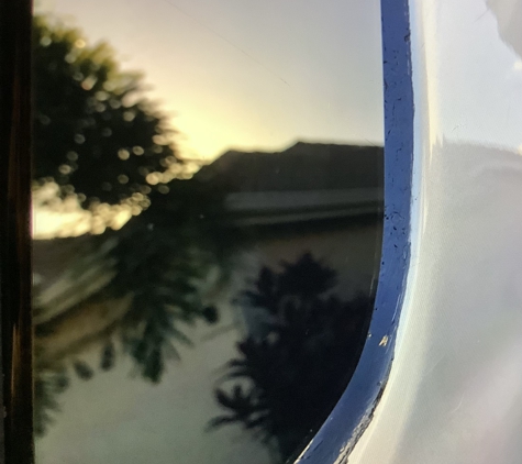 CHIPS AUTO GLASS - Fort Pierce, FL. Black adhesive around window ����