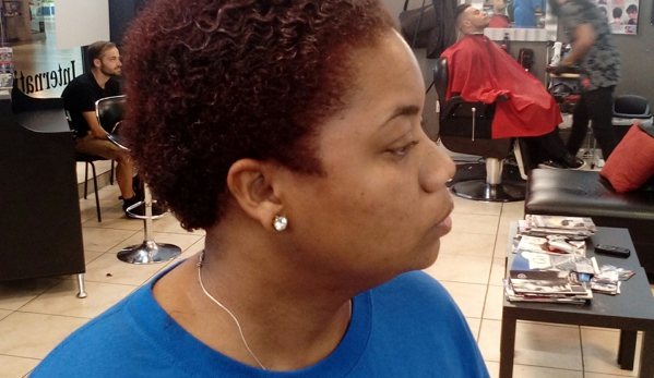 Castro's Cutz Barber shop - Clearwater, FL. Color and cut woman The Nefertiti