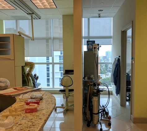 Bove Dental Studio. Gorgeos design with private treatment studios with amazing views of Brickell Centre and the River. #Brickell #Bove Dental Studio.