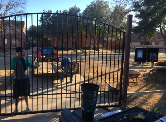 North Texas Garage Doors and Gates - Bedford, TX. A gate installation while in progress.