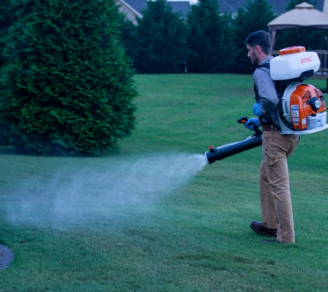 Stonewall Pest Control - Inman, SC. Using my blower to treat the yard for mosquitoes and other pests that run through to get to your home.