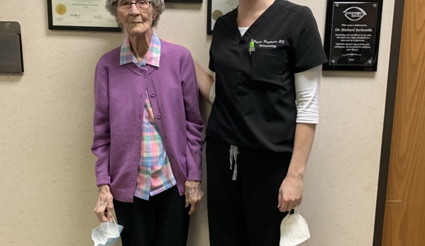 Howerton Eye Clinic - Austin, TX. Dr. Hawthorne with lovely patient