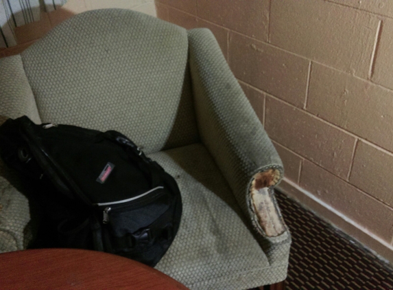 Travel Inn - Vineland, NJ. Dirty chair all the room have it