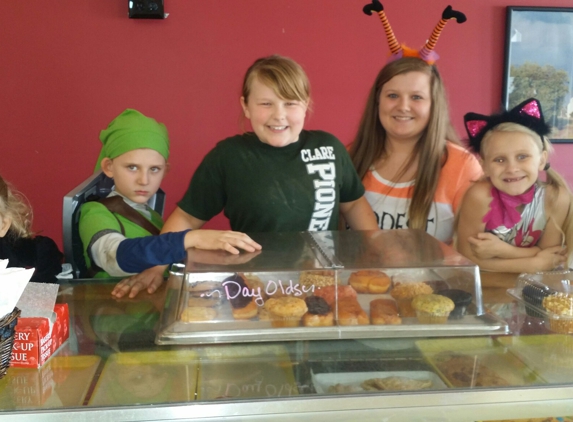 J T Bakers - Clare, MI. Bakery helpers on Halloween 2016.  They have free cookies you can  decorate as part of Clare Spooktacular.