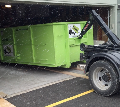 Bin There Dump That. Placing our 10 yard bin in a garage.