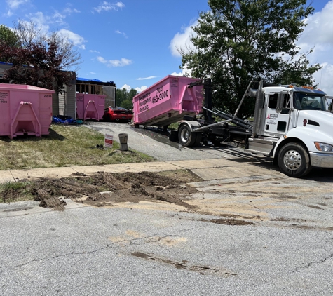 Delaware Dumpster Rentals - Middletown, DE. Pink cans dumpster rental