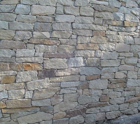 Grand Paving Pty Limited - Crows Nest, NSW. Grand Paving Bluestone Wall Restoration