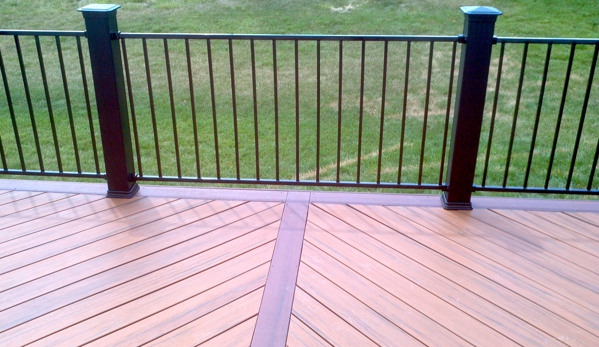 Americas Fence & Deck Company - Warrenton, MO. custom composite deck with aluminum hand rail installed in St. Charles Mo 63301