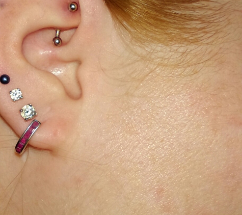 The Wall - Bartlesville, OK. Love my ear piercing! This is the only shop I'll get pierced from!