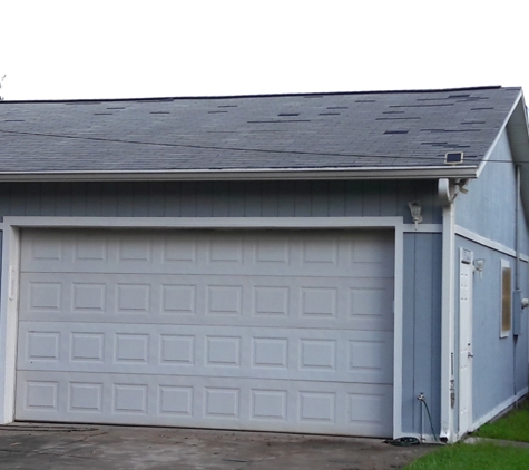 A Pro Quality Electric Service Corp - Palm Bay, FL. Shingles missing from the garage