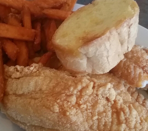 Shucks! - Abbeville, LA. Fried Catfish, Full w/ Sweet Potatoe Fries. Great meal! If you don't have a big appetite I recommend you get the half order.