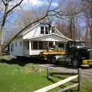 Wolfe House & Building Movers, LLC. - House & Building Movers & Raising