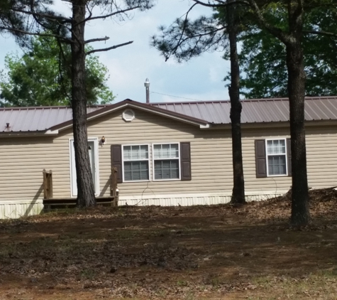 All Your Homework - Marshall, TX. Chocolate metal roof .