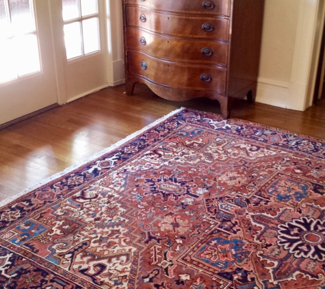 Nilipour Oriental Rugs - Birmingham, AL. Antique Persian Heriz offers a warm welcome to this foyer...  traditional geometric design along with classic oriental rug colors.