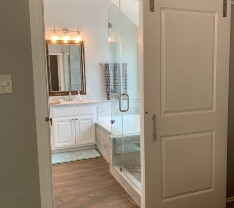 Vastine Remodeling & Construction - Dickinson, TX. Barn Door & Remodeled Bathroom in League City