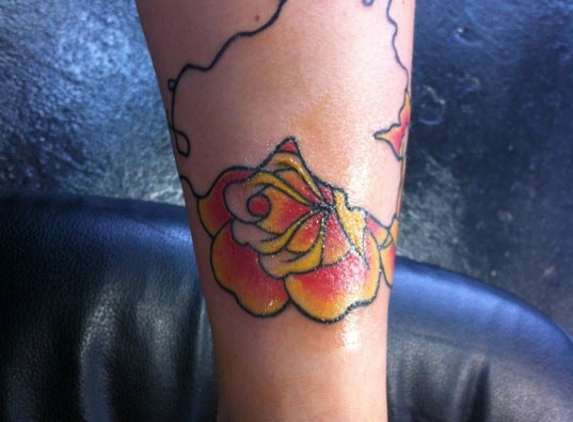 East Coast Worldwide Tattoo & Piercing - Jacksonville Beach, FL