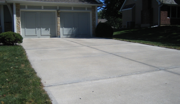 Home Sweep Home Cleaning Service, LLC - Olathe, KS. Driveway after sealed