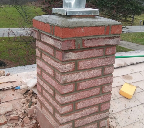 R.H.S. Construction Co. - Akron, OH. Chimney Retuckpointing and new top Cement Crown
Rittman,Ohio