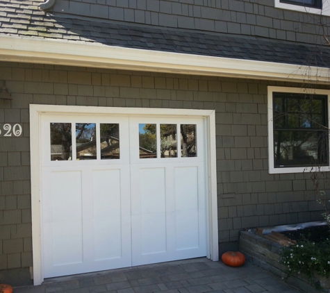 Silicon valley Overhead doors - Sunnyvale, CA. Carriage style primed wood door.
