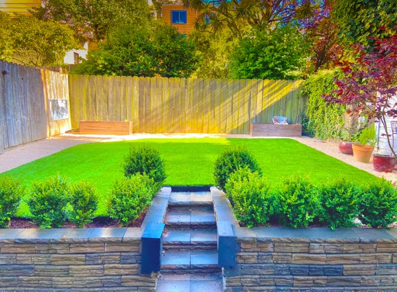 Lino's Landscape - Millbrae, CA. Complete backyard renovation, with retaining wall planter box, steps and turf installation