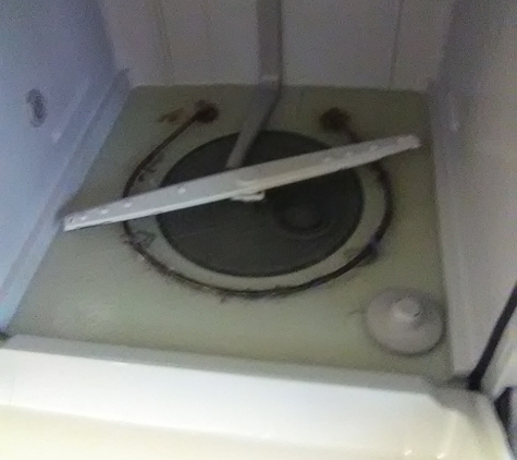 Corliss Home Repairs. Inside of Dishwasher.  Cannot drain due to improper installation of kitchen plumbing