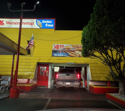 Wienerschnitzel - Yuma, AZ. Bill Lewis of Vero Beach, Florida, making a quick pitstop at Wienerschnitzel of Yuma, Arizona.