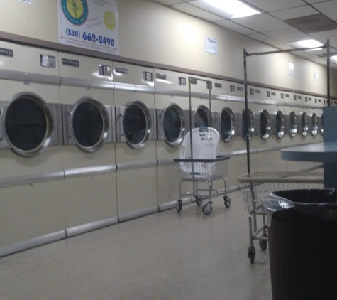 Launderworld - Woodland, CA. Very clean, quite, many washer size options. Lots of dryers. Snake bar, laundry soap etc. You can buy. Tv and 2 video for kids.