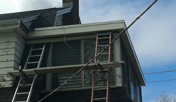 Open Doors Construction - Quincy, MA. We replaced the soffits and facias 