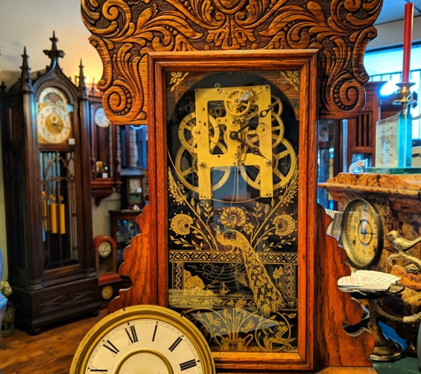 Jimmy's Alpine Clock Shop. Kitchen Clock with etched glass peacock design