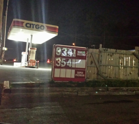 Citgo - Brookhaven, GA. The remains of the price sign attaçhed to a fence, still in use