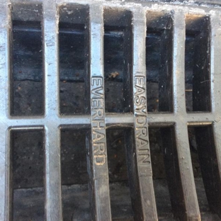 T&J Concreting - Narre Warren South, VIC. Concrete left in the bottom of the drain that he put in.