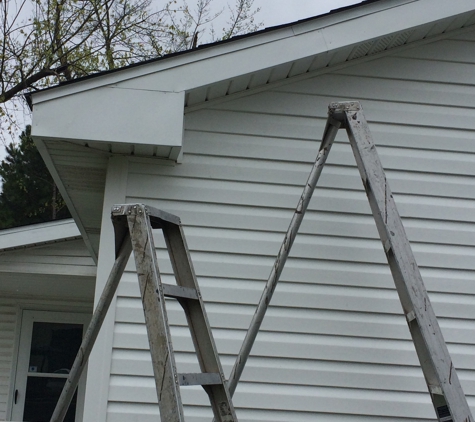 Seamless Gutters & More - Rogers, AR. Siding soffit and I replace any rotten wood