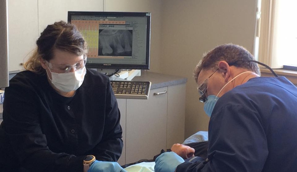 Cascade Dental Care - North Spokane - Spokane, WA. Spokane dentist Dr. Robert Walker treating dental implants patient at Cascade Dental Care - North Spokane