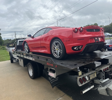JAX DISCOUNT TOWING LLC - Jacksonville, FL. Beautiful red Ferrari
