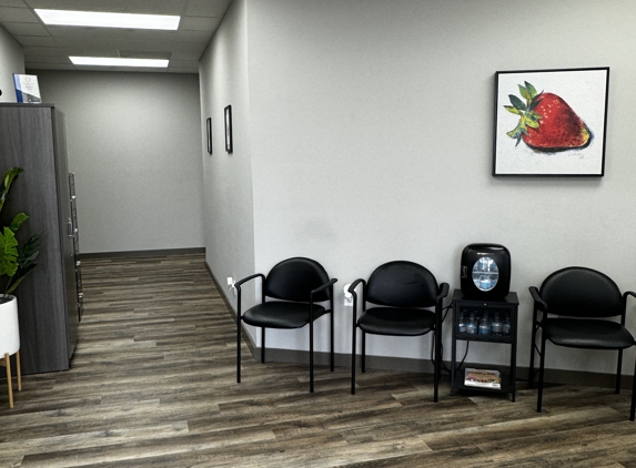 Medberry Primary Care - San Antonio - San Antonio, TX. Waiting room with complimentary waters!